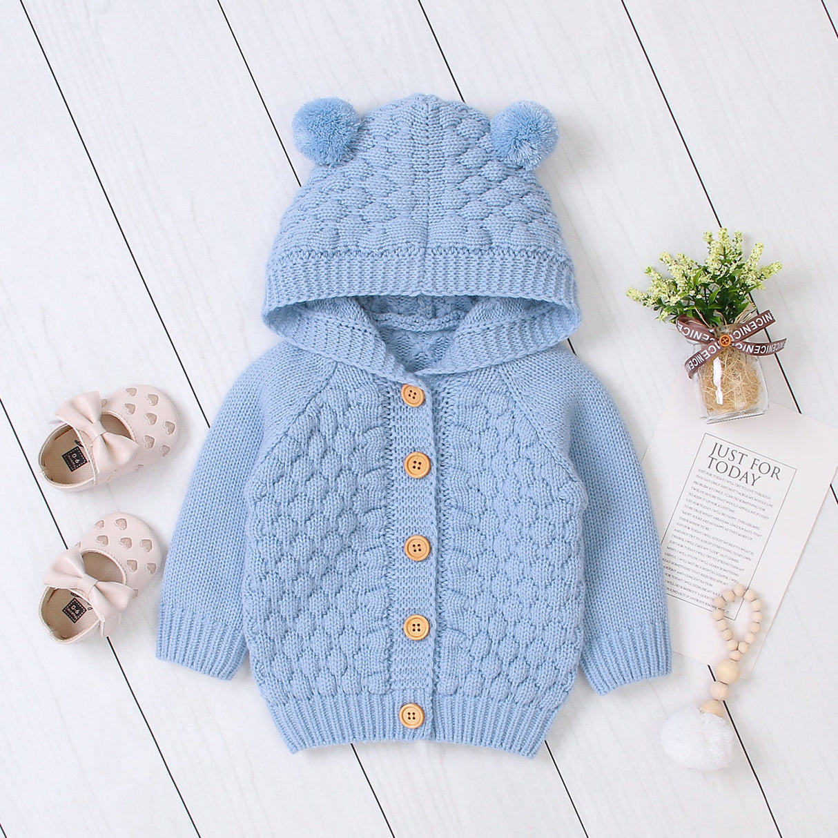 Wool ball hooded knitted jacket