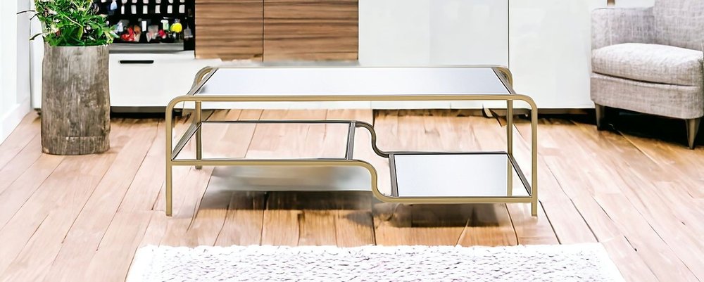 52" Clear and Gold Mirrored Glass And Iron Coffee Table With Shelf