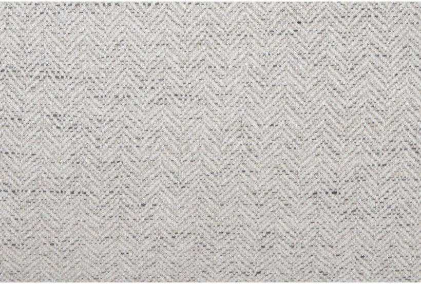A close-up of the beige chenille fabric on Thea Down's 101 Inch Sofa reveals a subtle zigzag herringbone pattern. The material appears soft and woven, perfect for upholstery.