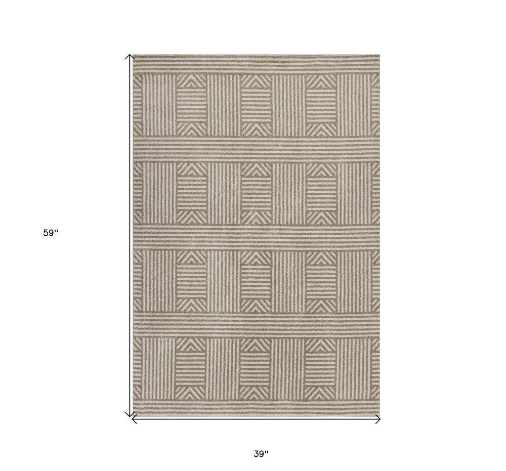7' X 9' Beige And Ivory Geometric Indoor Outdoor Area Rug