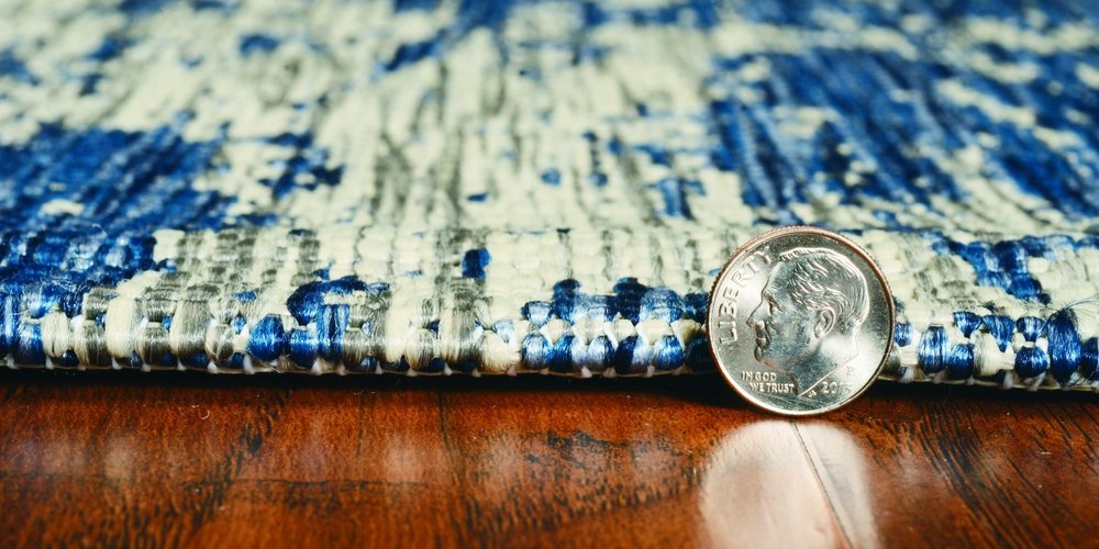 5' X 8' Blue And Green Abstract Indoor Outdoor Area Rug