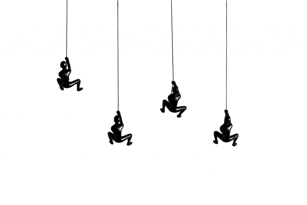 Set of Four Black Resin Climbing Man Hanging Dimensional Sculpture