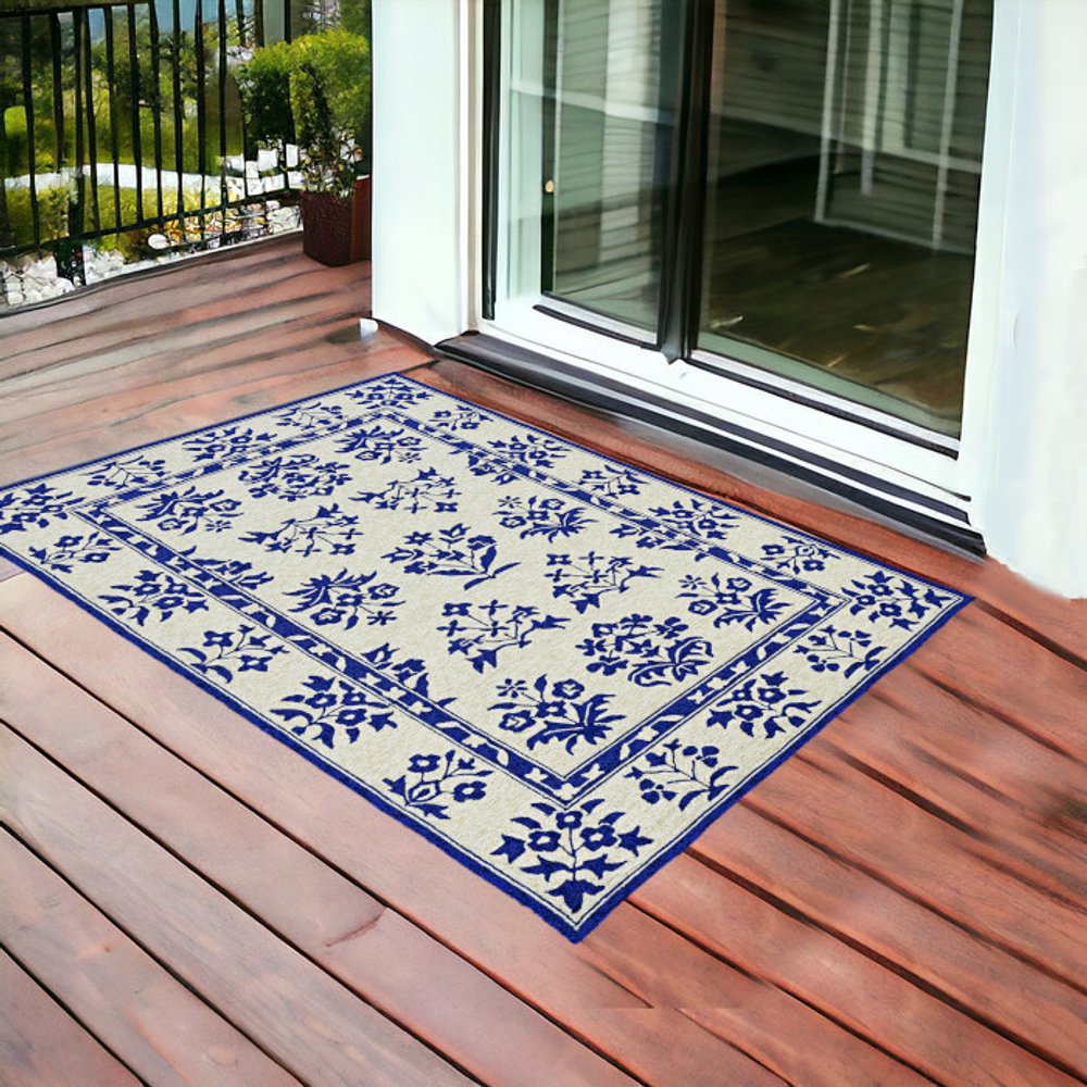 5' X 7' Sand Or Blue Floral Bordered Indoor Outdoor Area Rug