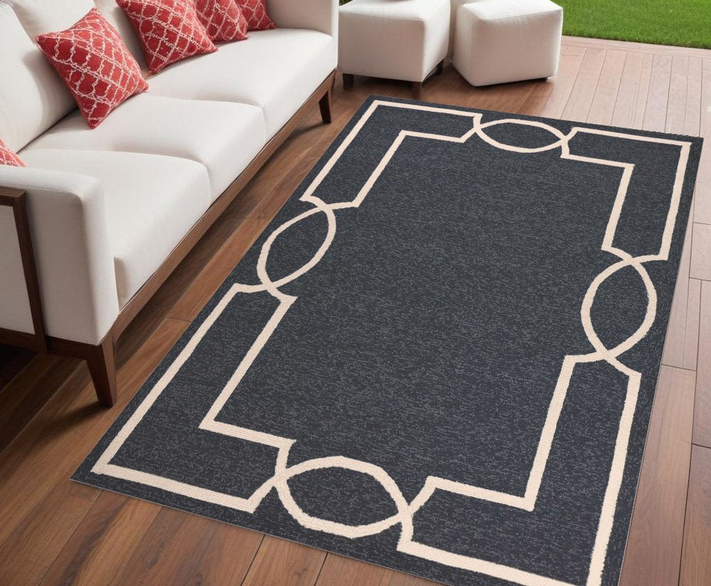 7' Onyx And Ivory Round Geometric Handmade Indoor Outdoor Area Rug