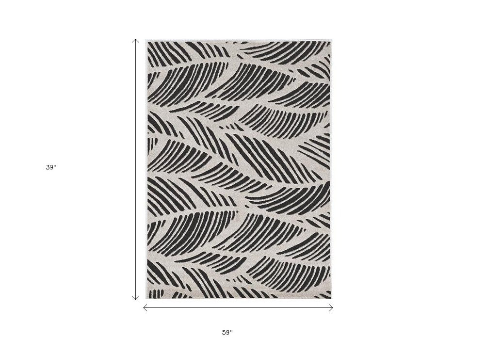 2' X 4' Black And White Abstract Indoor Outdoor Area Rug