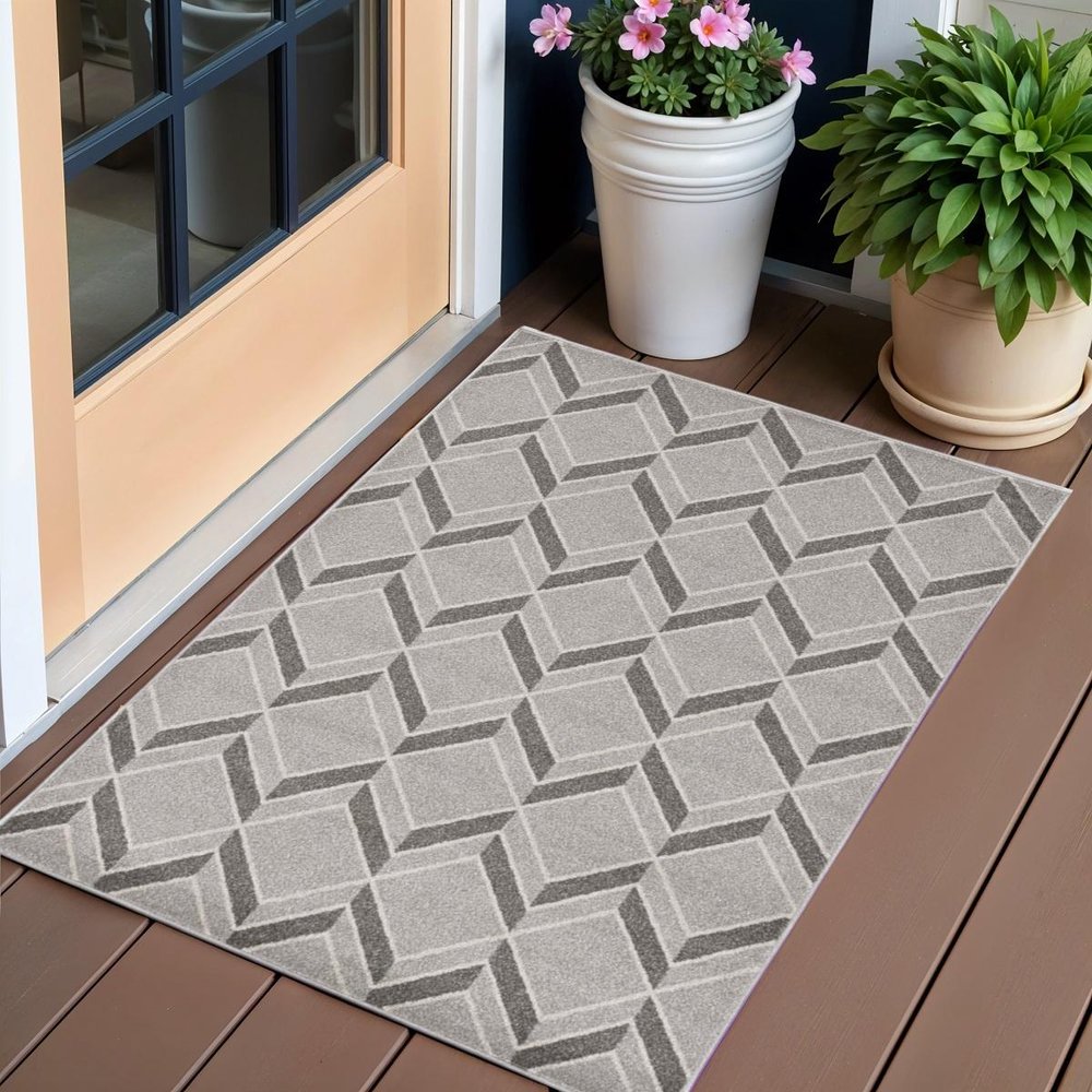 2' X 4' Green And Ivory Geometric Indoor Outdoor Area Rug
