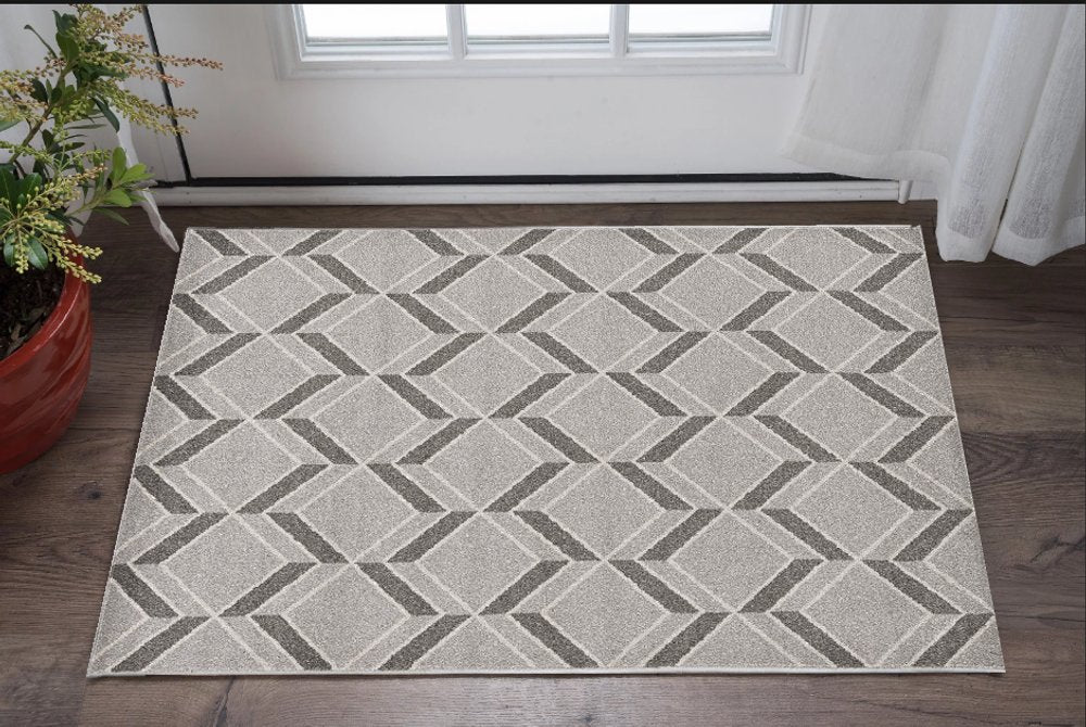 2' X 4' Green And Ivory Geometric Indoor Outdoor Area Rug