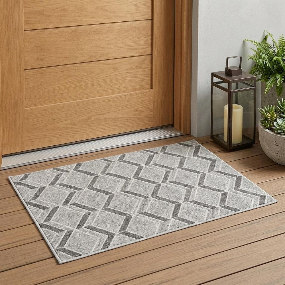 2' X 4' Green And Ivory Geometric Indoor Outdoor Area Rug