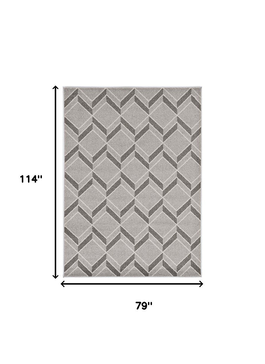 2' X 4' Green And Ivory Geometric Indoor Outdoor Area Rug