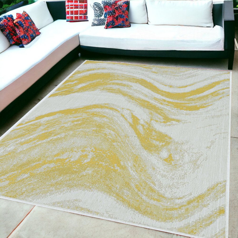 5' X 8' Gold And Ivory Abstract Indoor Outdoor Area Rug