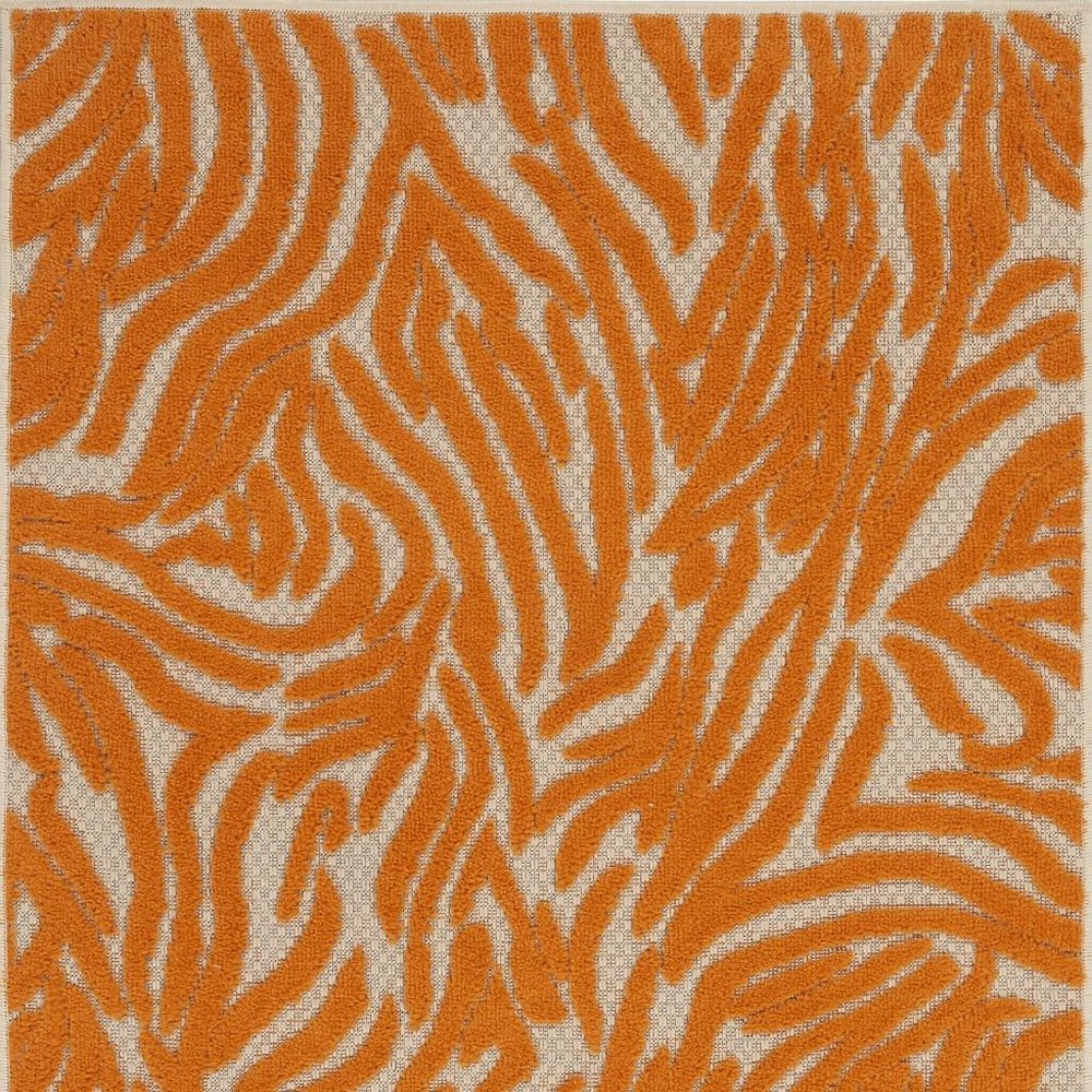 4' X 6' Orange And Ivory Abstract Stain Resistant Indoor Outdoor Area Rug