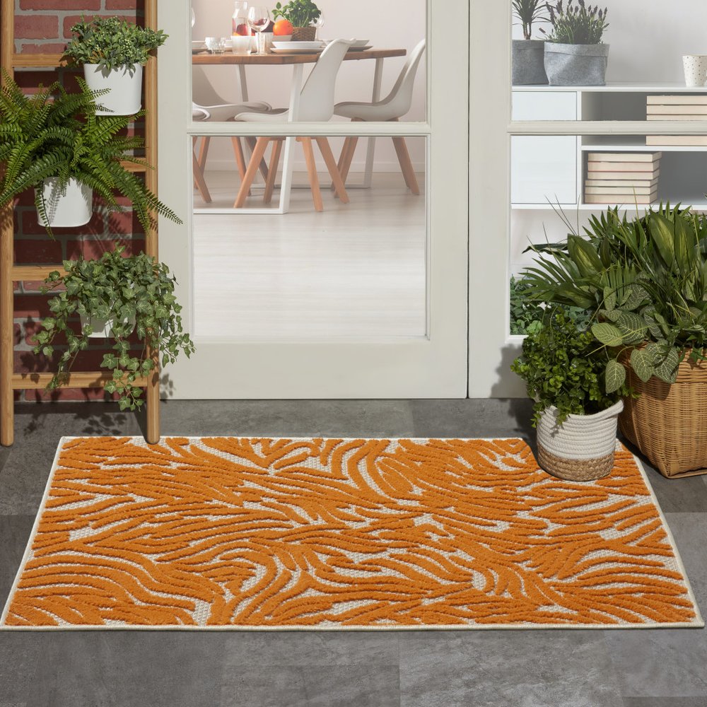 4' X 6' Orange And Ivory Abstract Stain Resistant Indoor Outdoor Area Rug