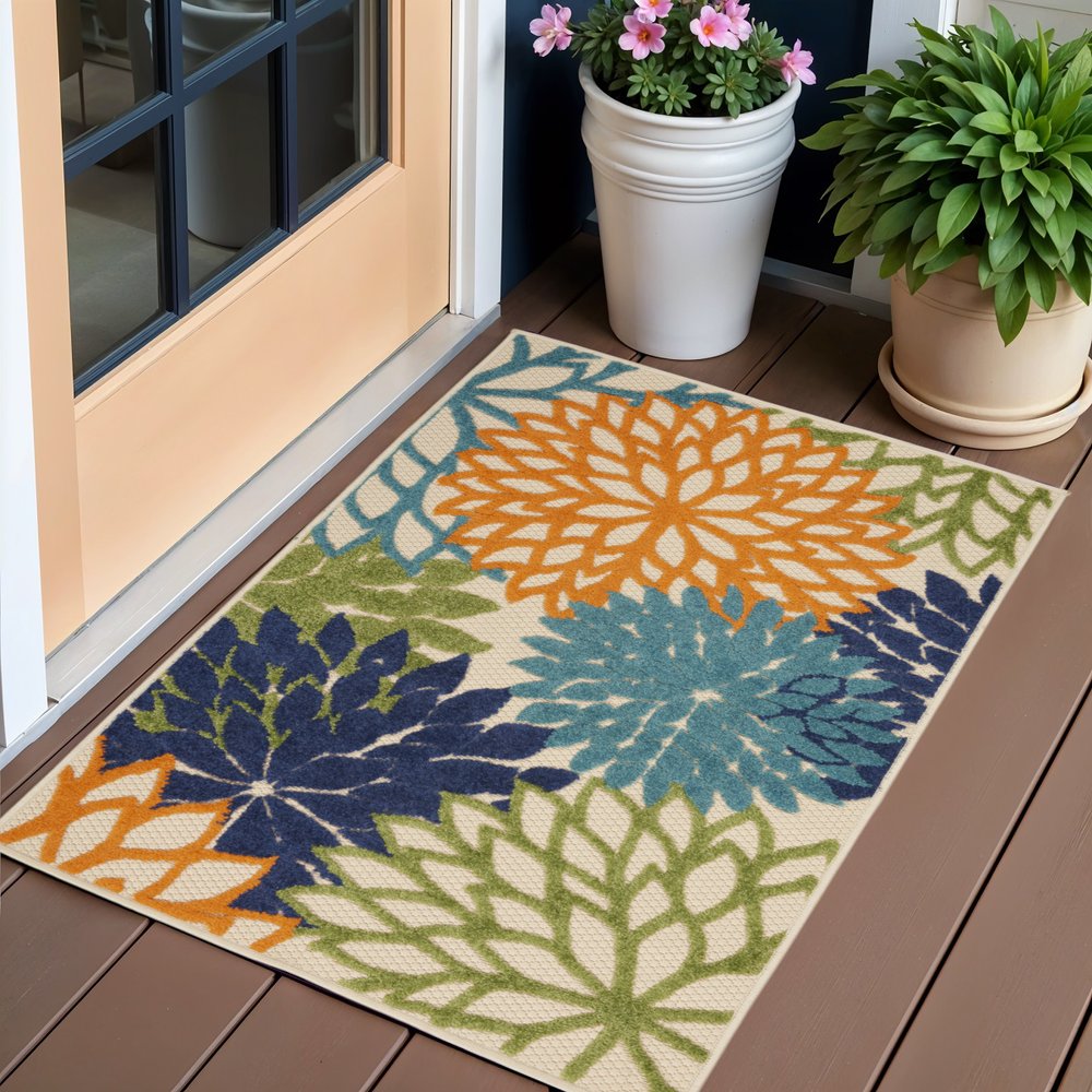 5' X 8' Ivory And Blue Floral Indoor Outdoor Area Rug