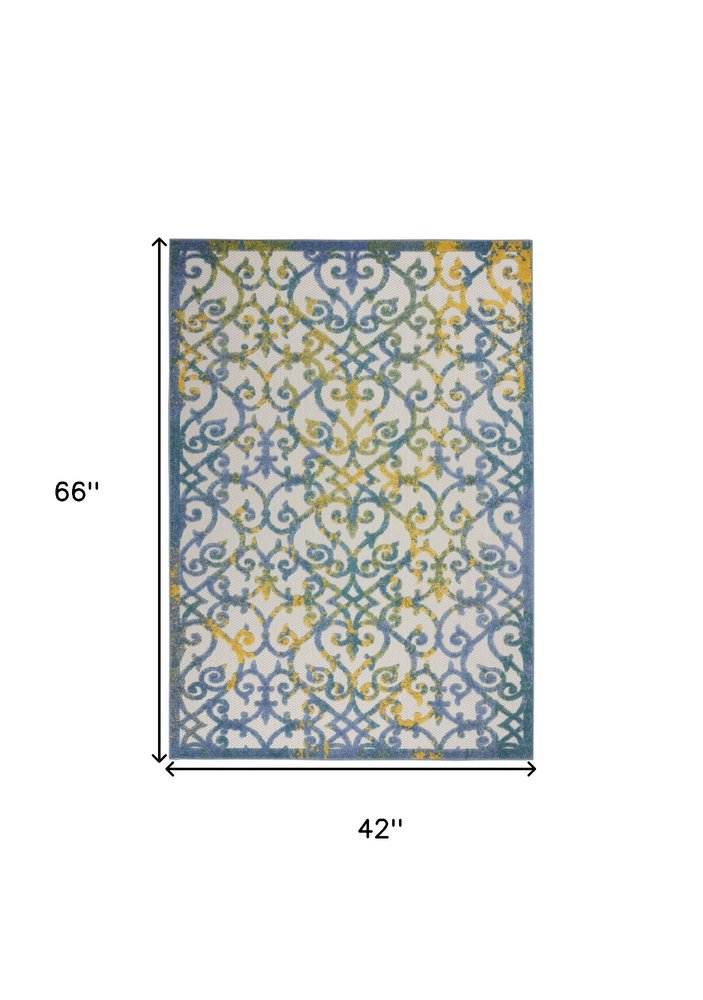 8' X 11' Ivory And Blue Indoor Outdoor Area Rug