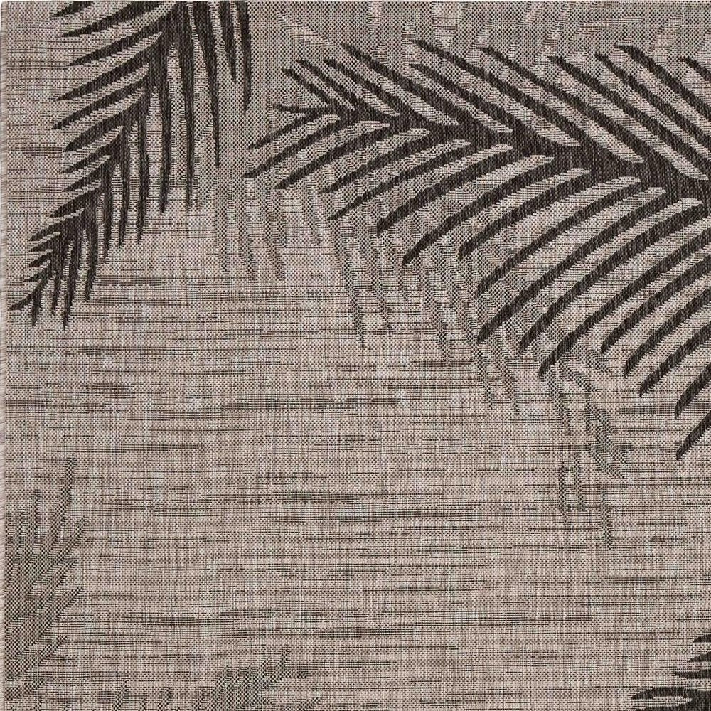 5' X 7' Beige And Red Palm Leaf Indoor Outdoor Area Rug