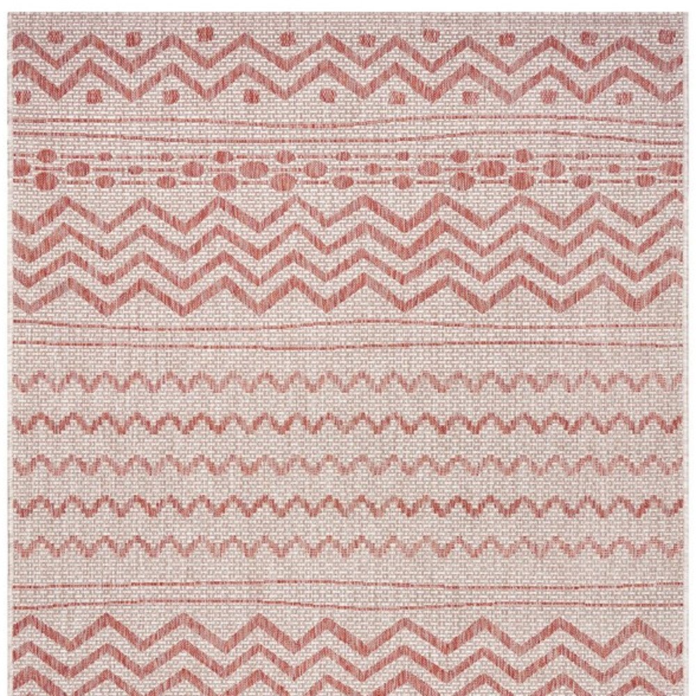 8' X 10' Beige And Red Chevron Indoor Outdoor Area Rug