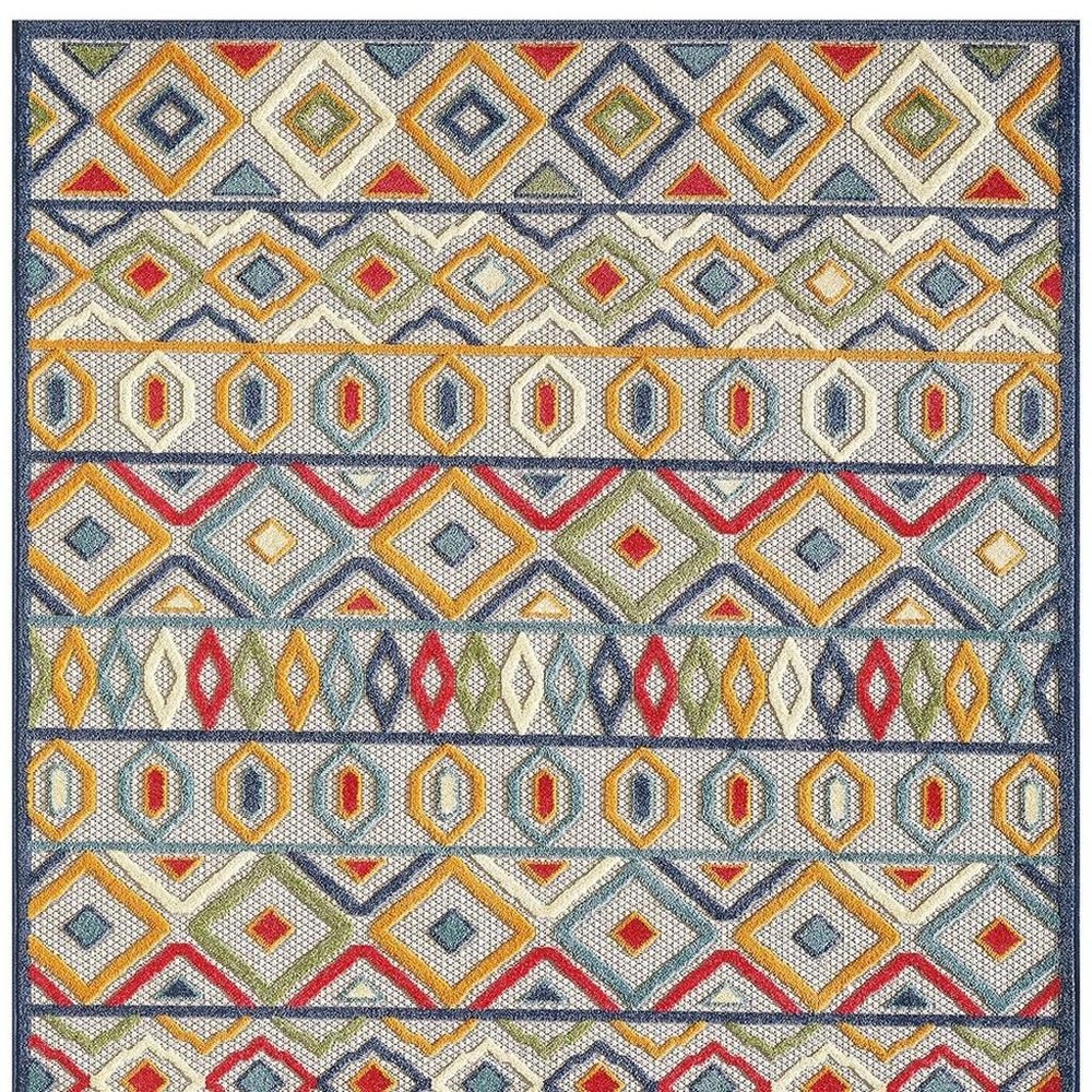 5' X 7' Ivory And Blue Southwestern Stain Resistant Indoor Outdoor Area Rug