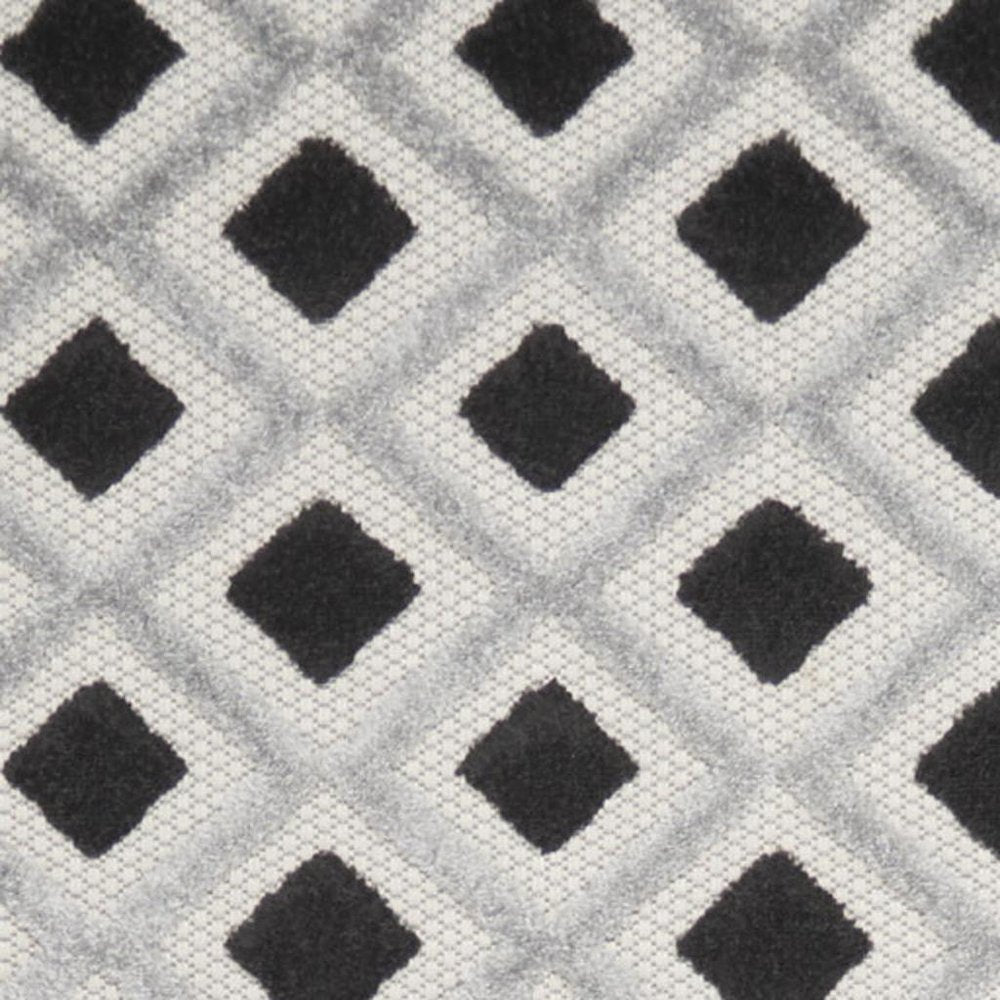 10' Black And White Indoor Outdoor Runner Rug