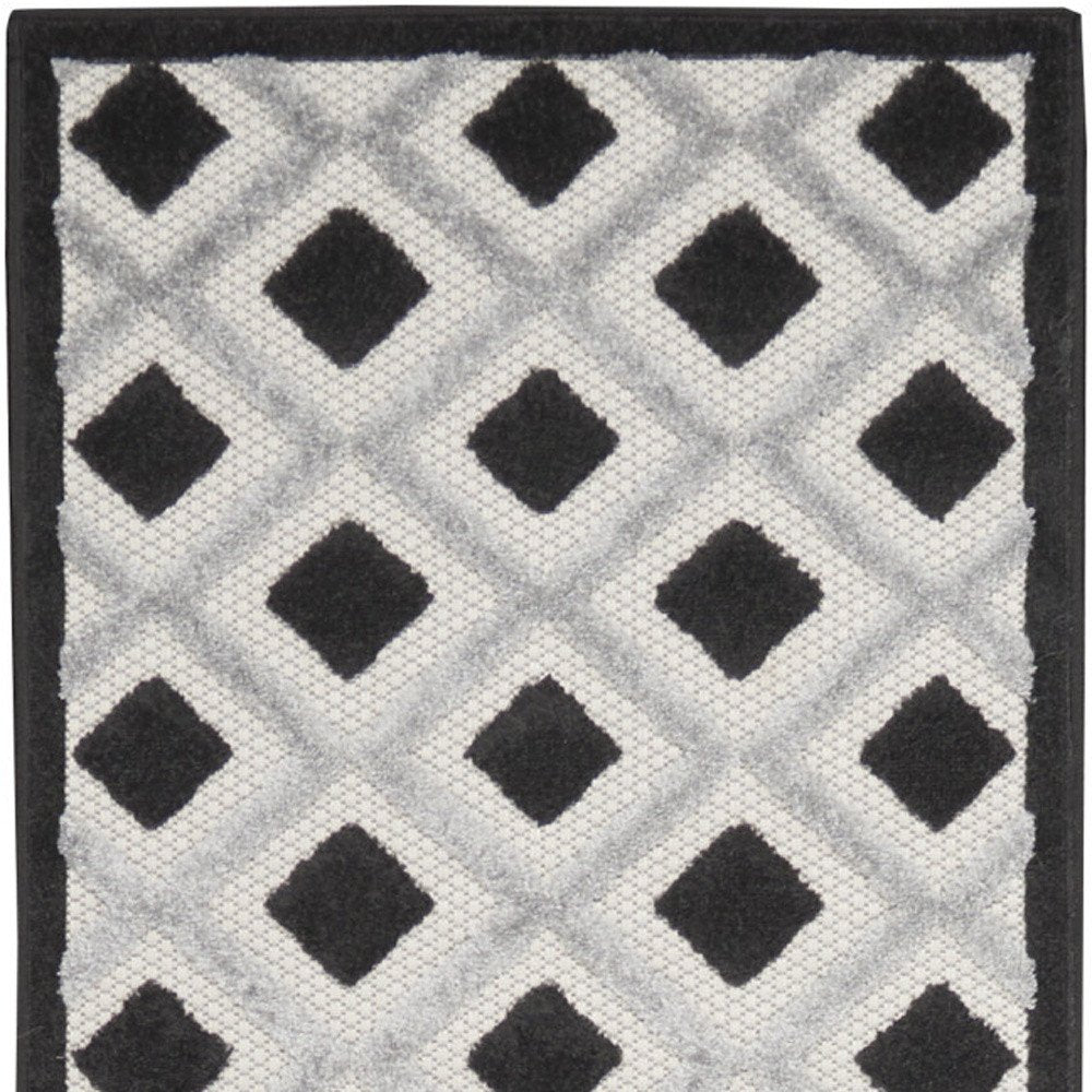 10' Black And White Indoor Outdoor Runner Rug