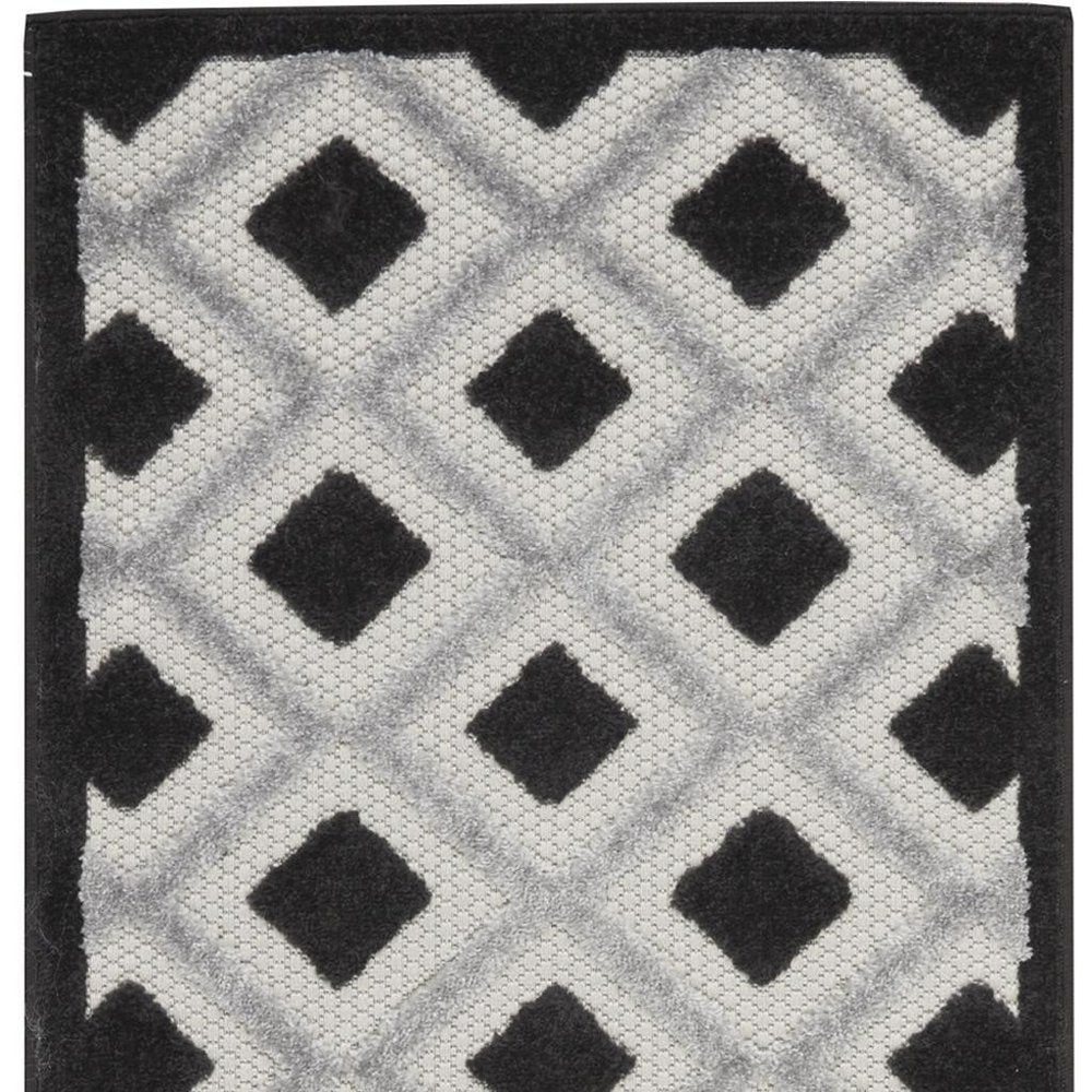 8' Black And White Indoor Outdoor Runner Rug