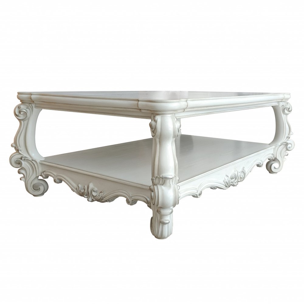 57" Antiqued White Wood Coffee Table With Shelf