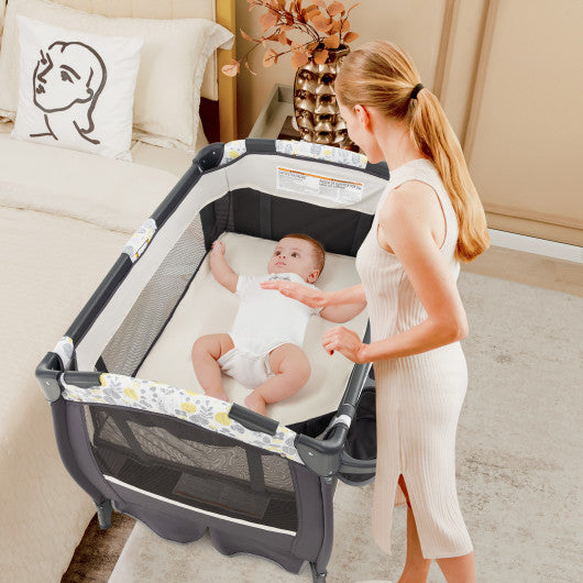 4 in 1 Portable Pack and Play Baby Nursery Center with Bassinet-Yellow