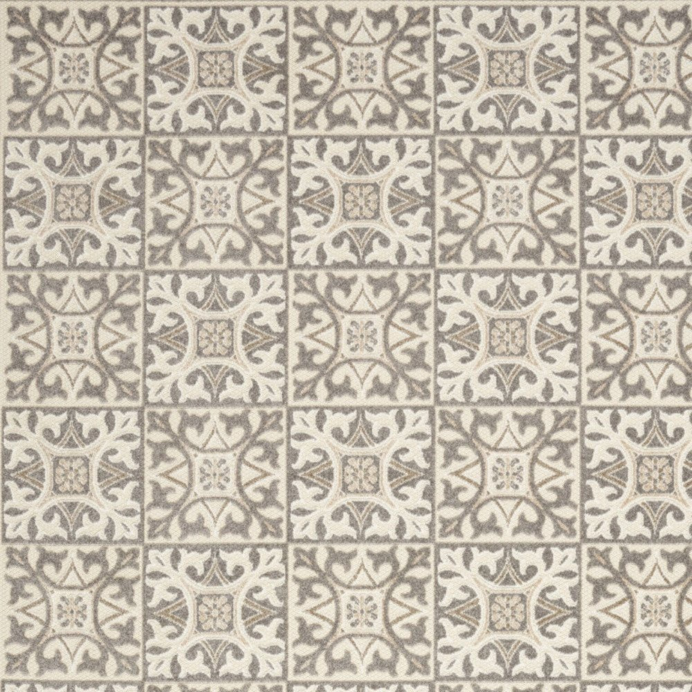 6' X 9' Ivory And Grey Fleur De Lis Stain Resistant Non Skid Area Rug