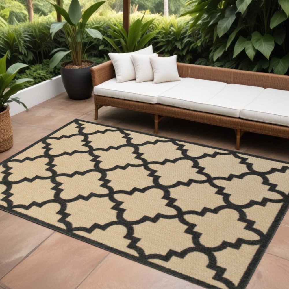 7' X 10' Beige and Black Geometric Stain Resistant Indoor Outdoor Area Rug