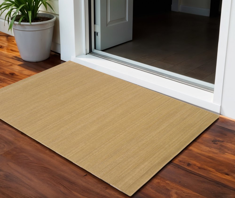 2' X 4' Beige Stain Resistant Indoor Outdoor Area Rug