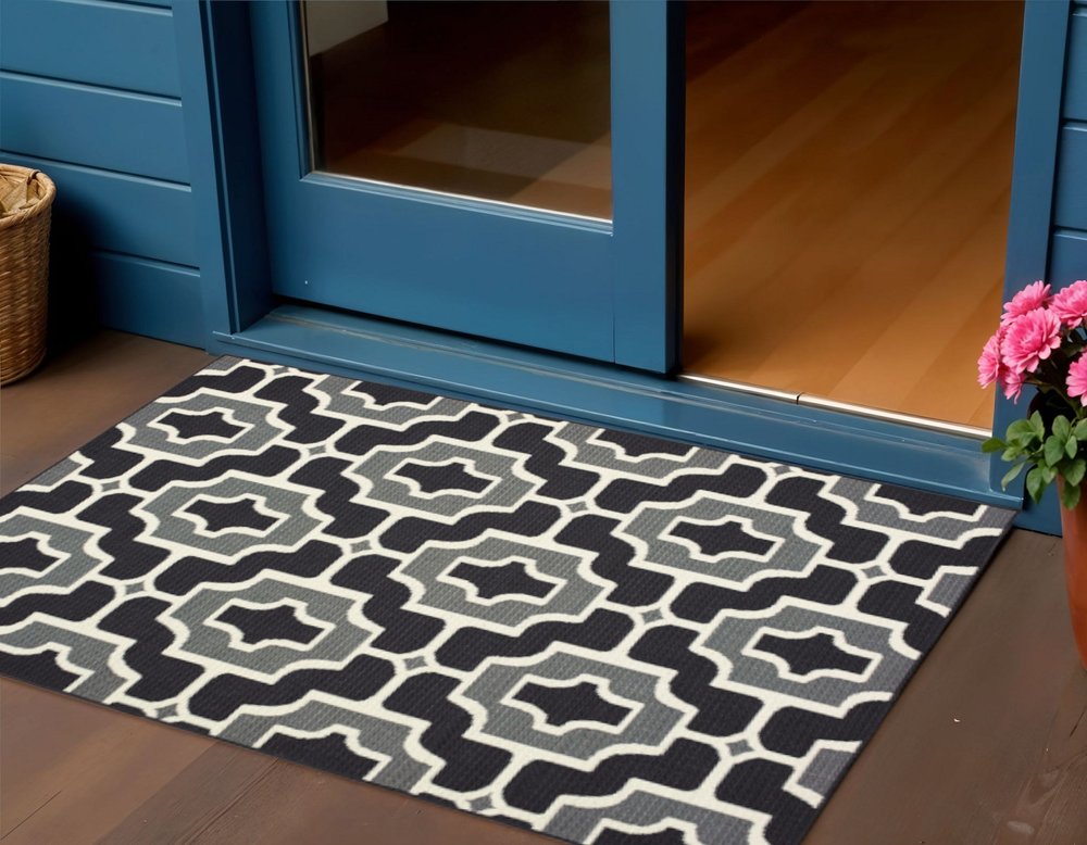 2' X 4' Black and Gray Geometric Stain Resistant Indoor Outdoor Area Rug