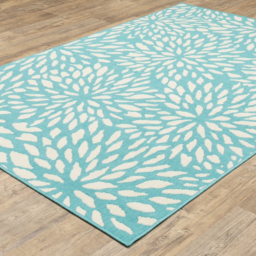 5' X 8' Blue and Ivory Floral Stain Resistant Indoor Outdoor Area Rug
