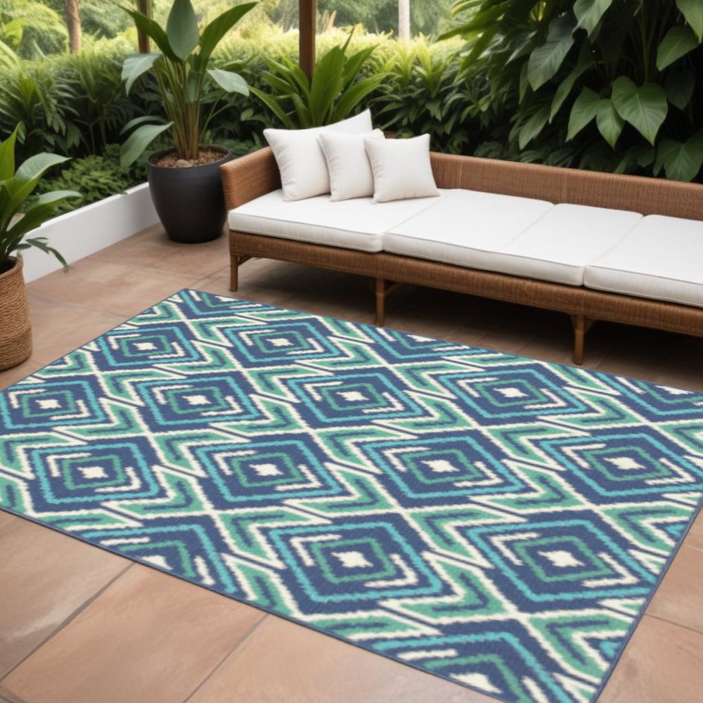 7' X 10' Blue and Ivory Geometric Stain Resistant Indoor Outdoor Area Rug