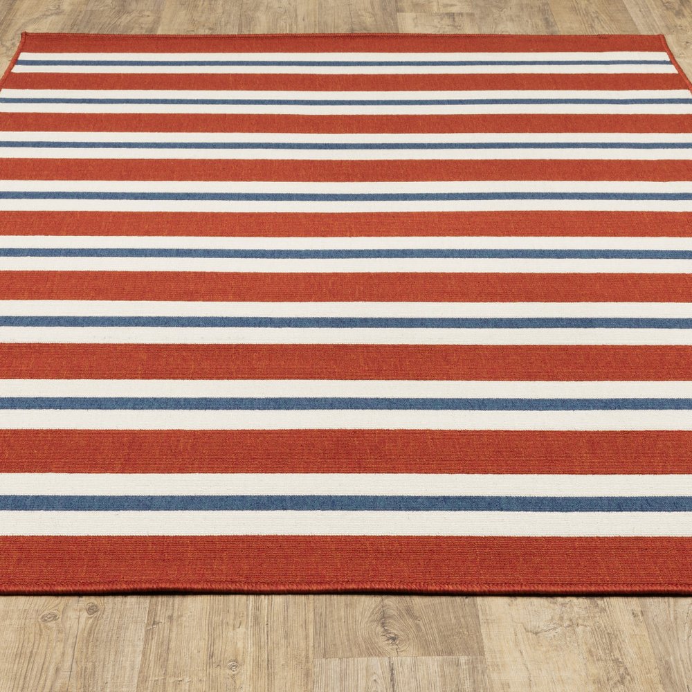 7' X 10' Red and Ivory Geometric Stain Resistant Indoor Outdoor Area Rug