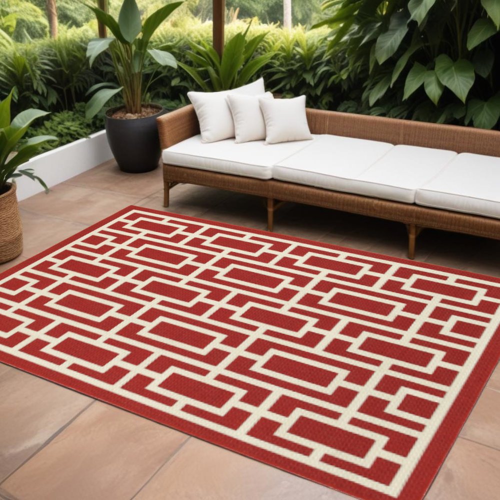 9' X 13' Red and Ivory Geometric Stain Resistant Indoor Outdoor Area Rug