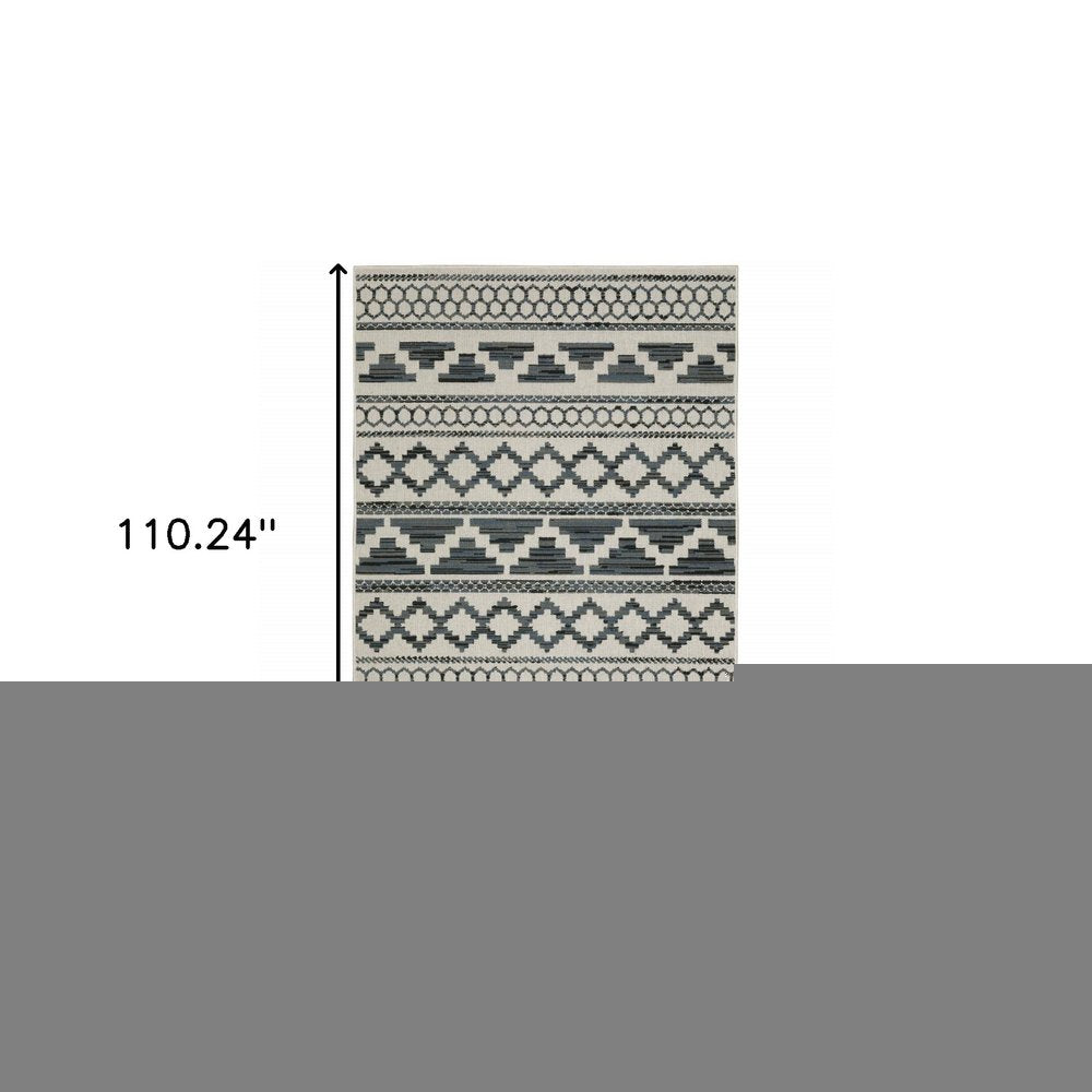 7' X 9' Blue and Beige Geometric Stain Resistant Indoor Outdoor Area Rug