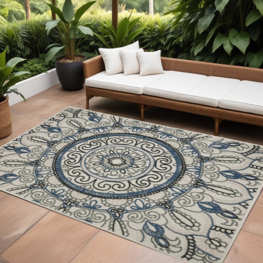 7' X 9' Blue and Beige Geometric Stain Resistant Indoor Outdoor Area Rug