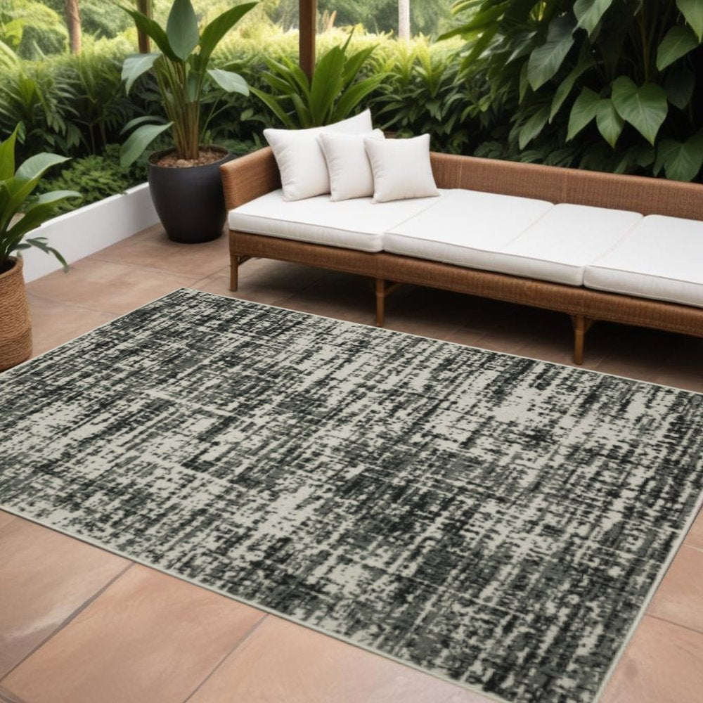10' X 13' Beige and Black Abstract Stain Resistant Indoor Outdoor Area Rug
