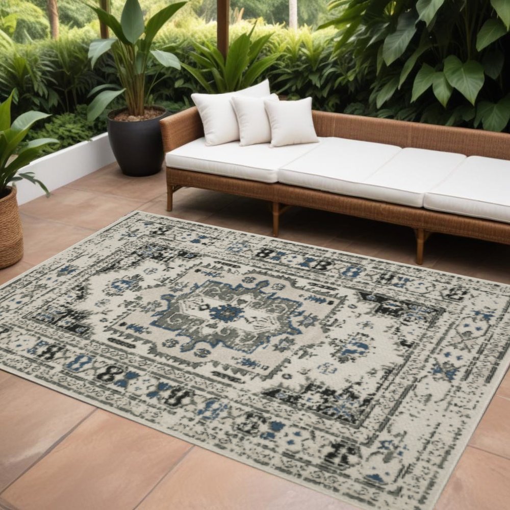 7' X 9' Blue and Beige Oriental Stain Resistant Indoor Outdoor Area Rug