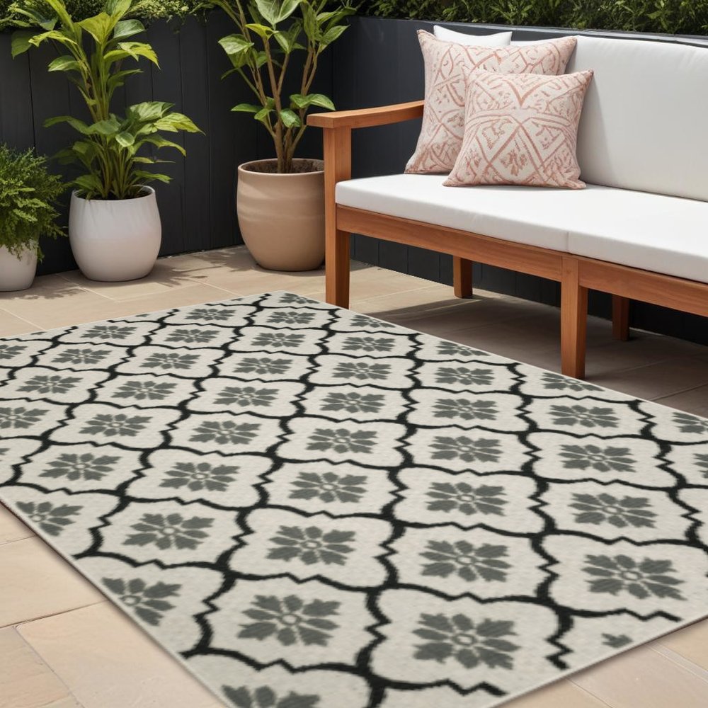7' X 9' Beige and Black Geometric Stain Resistant Indoor Outdoor Area Rug