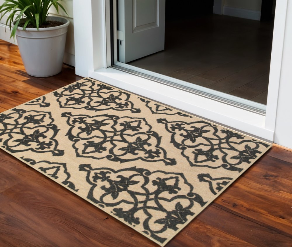 2' X 3' Beige and Black Oriental Stain Resistant Indoor Outdoor Area Rug