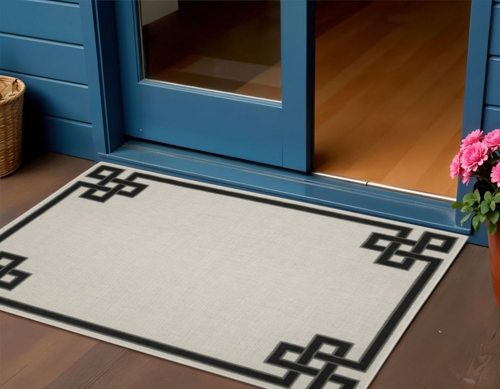 2' X 4' Beige and Black Stain Resistant Indoor Outdoor Area Rug
