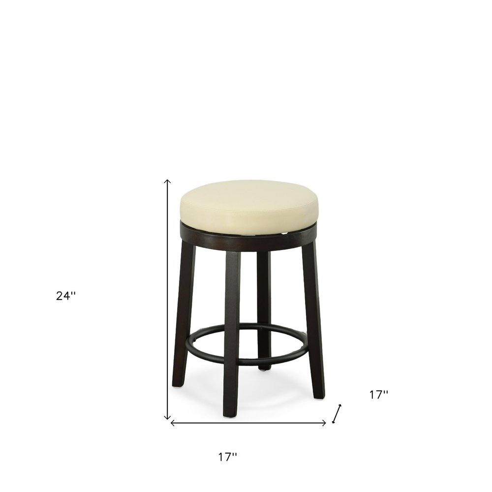 Set of Two 24" Cream and Espresso Faux Leather and Solid Wood Backless Counter Height Swivel Bar Chairs
