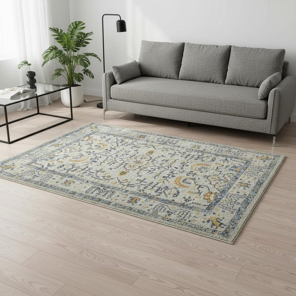 8' Ivory And Yellow Oriental Distressed Runner Rug