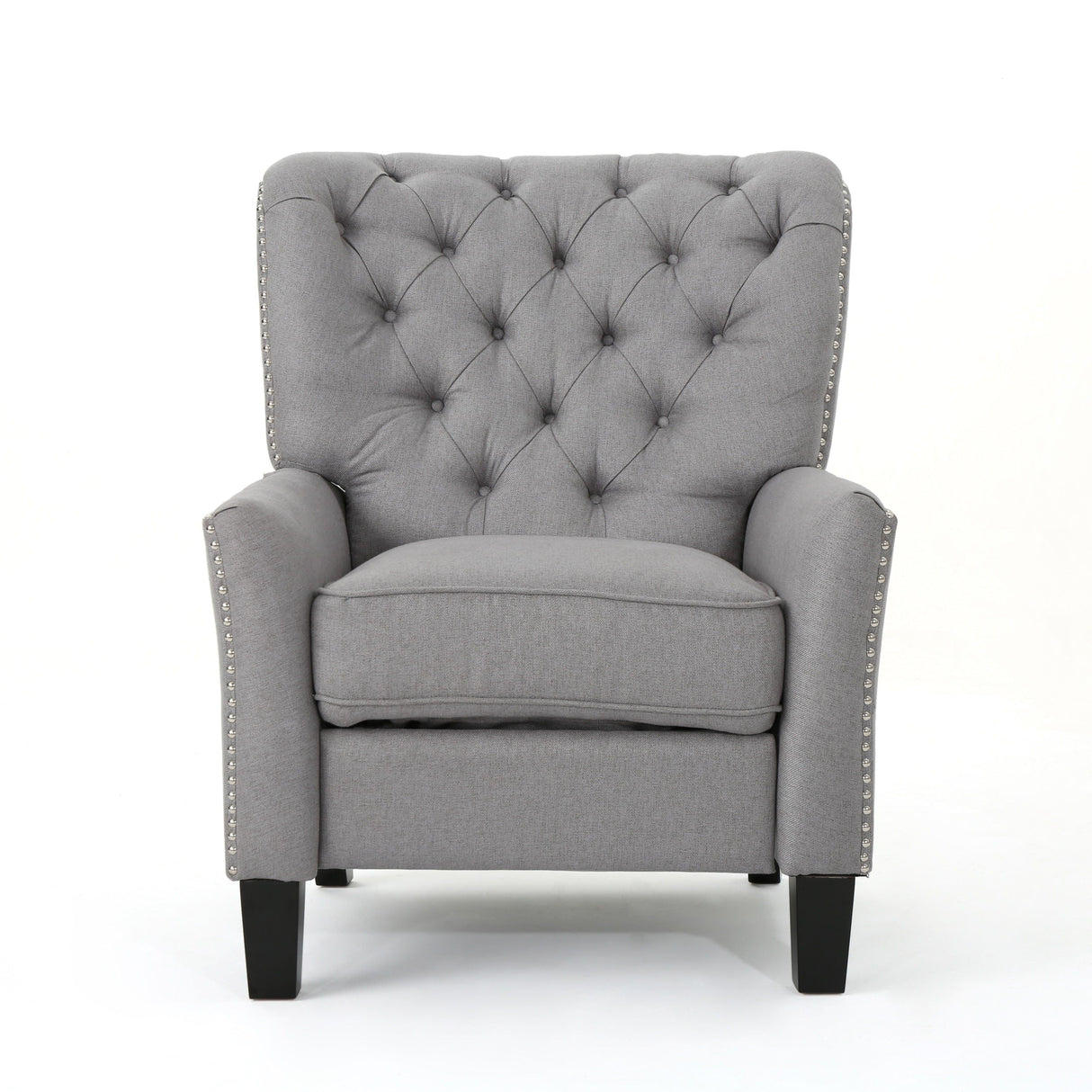 The Modern Push Back Recliner is a gray, tufted armchair with decorative buttons and nailhead trim. It has a cushioned seat, high back, and dark wooden legs, set against a plain white background.