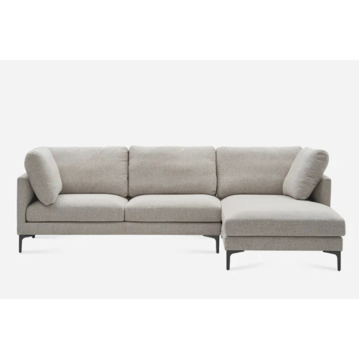 A modern gray sectional sofa with a chaise lounge on the right side. It has minimalist design and clean lines, featuring plush cushions and black legs, set against a plain white background.