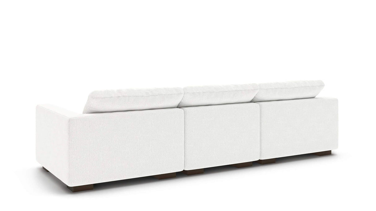 Rear view of the Like Butter 106" Sofa in Enzo/Cream Leather, featuring plush cushions and straight armrests, set against a plain white background.