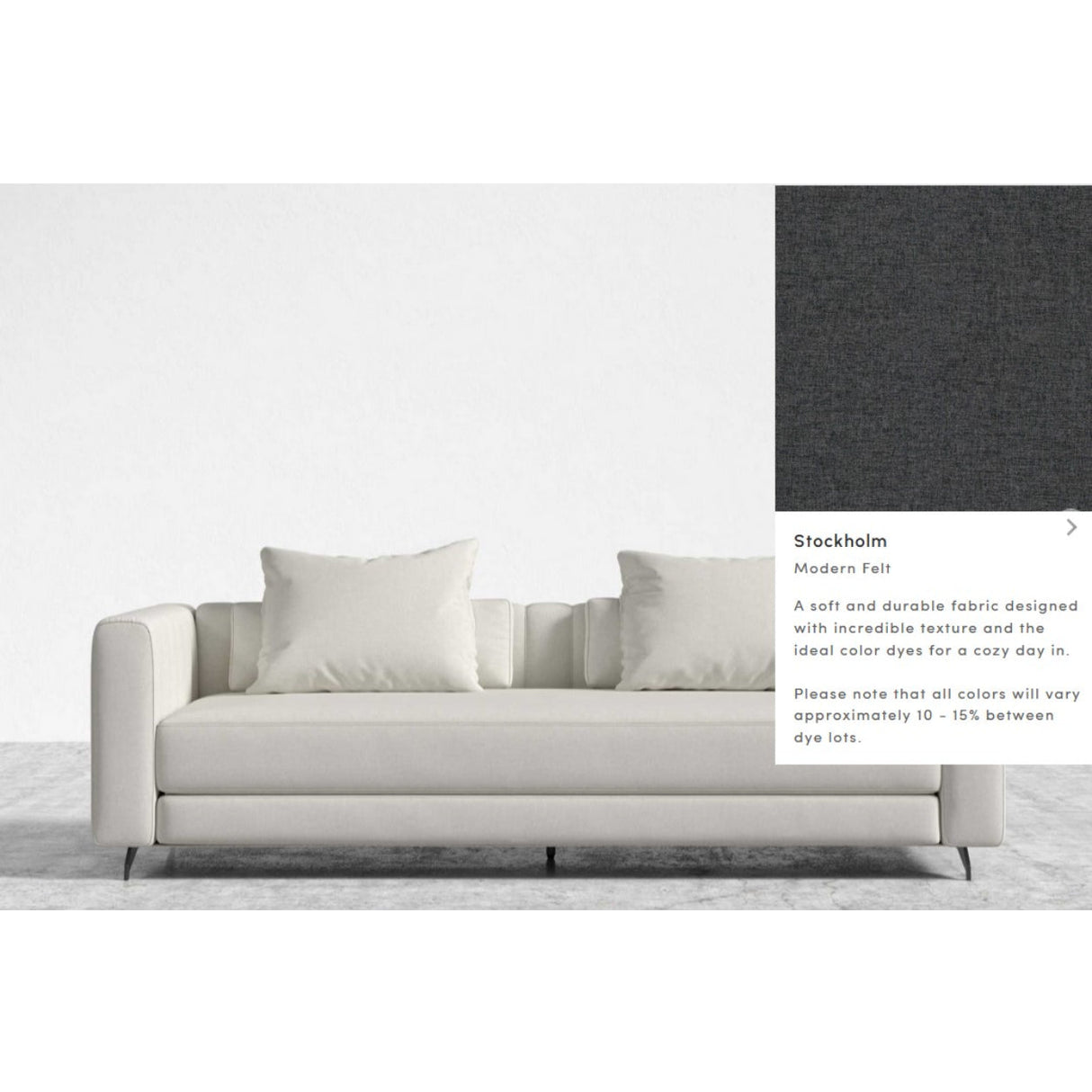 The Berlin Sleeper Sofa is a contemporary piece in a light shade, featuring two large and two smaller cushions. It is upholstered in the "Stockholm Modern Felt" fabric, renowned for its soft and durable qualities. The accompanying image displays a fabric sample with a dark, textured appearance.