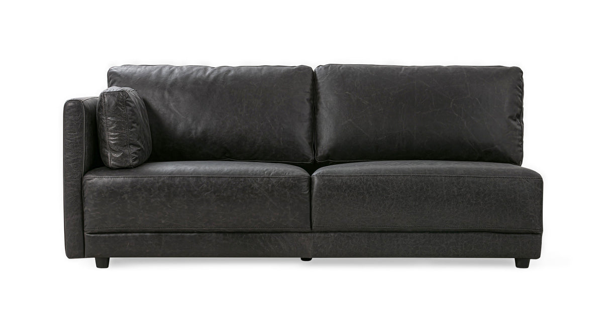 The Domus 93" Leather Sofa, featuring a modern design with clean lines, short sturdy legs, and upholstered in dark leather. It includes two back cushions and one side cushion, set against a white background.