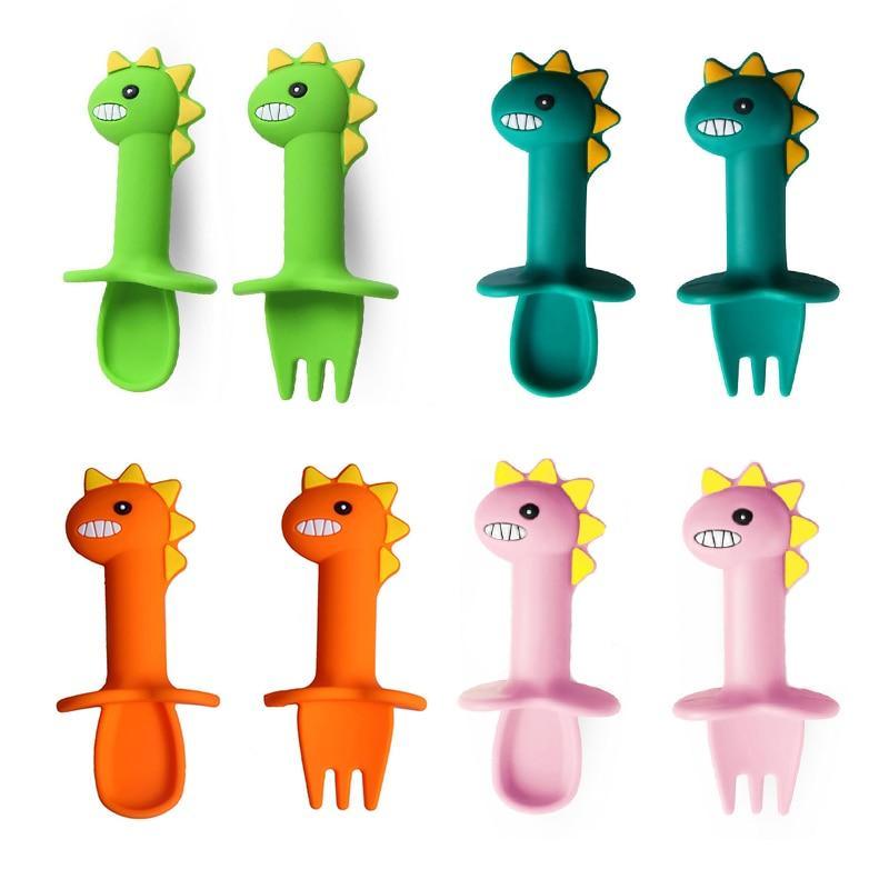 New Baby Feeding Spoon Fork Set Short Easy Cartoon Dinosaur Soft Silicone Teether Toys Non-hurt Training Tableware
