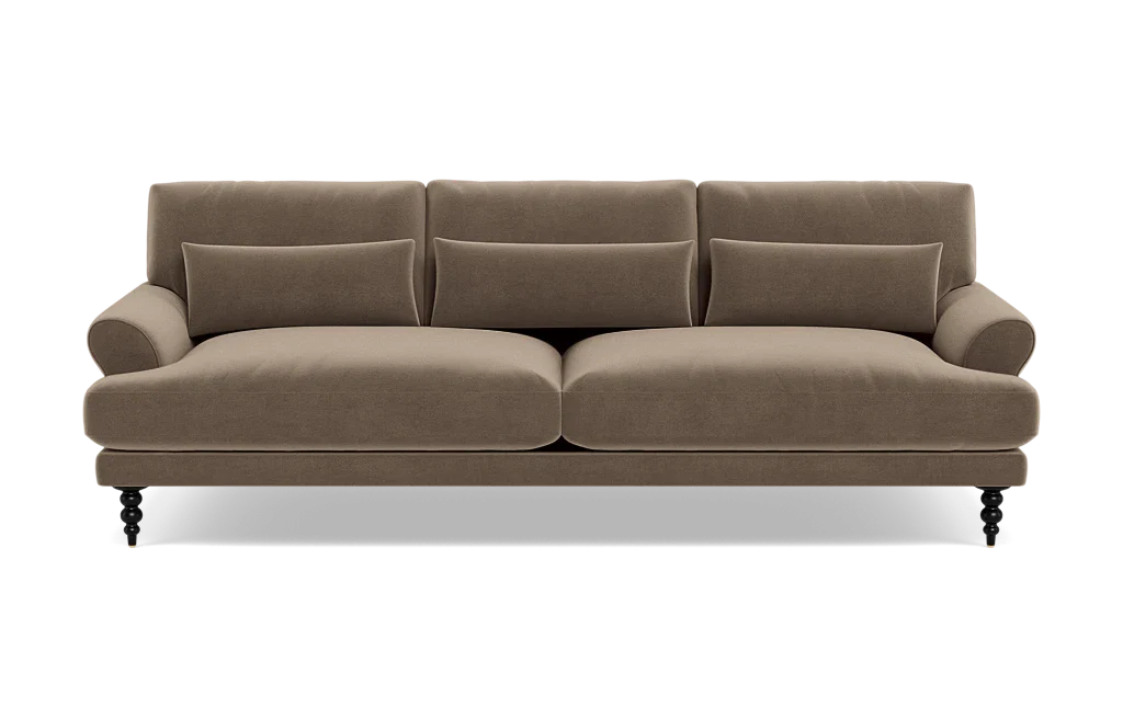 Introducing the Maxwell Custom Sofa: a classic and elegant piece featuring a rich brown color. This sophisticated three-seater sofa is designed with two seat cushions and three back cushions, complemented by rounded armrests. It stands gracefully on black, turned wood legs, adding a touch of timeless charm to any space.